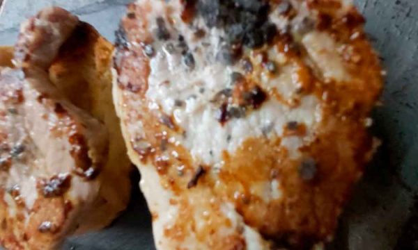 Secreto de Cerdo a la parrilla con guarnición